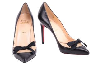 Christian Louboutin - a pair of 'Love Me' bow pumps in black leather, pointed-toe vamp with beige
