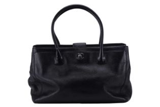 Chanel - an Executive tote bag in black grained leather, constructed with textile-lined interior,