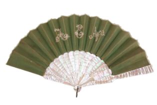 An Edwardian hand fan in mother-of-pearl, silk and lace, with fifteen mother-of-pearl sticks,