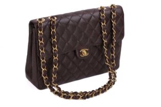 Chanel - a Jumbo classic single flap bag in brown diamond-quilted caviar leather, circa 2002,