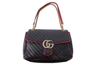 Gucci - a GG Marmont shoulder bag in black diagonal-quilted calfskin leather and wine red piping