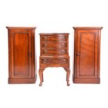 A pair of Victorian mahogany pedestal night cupboards with radius corners and single-panelled