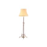 An Arts & Crafts style brass standard lamp in the manner of WAS Benson, 20th Century, the