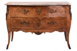A Louis XV and later marbled topped serpentine bombe commode, with marquetry inlaid kingwood