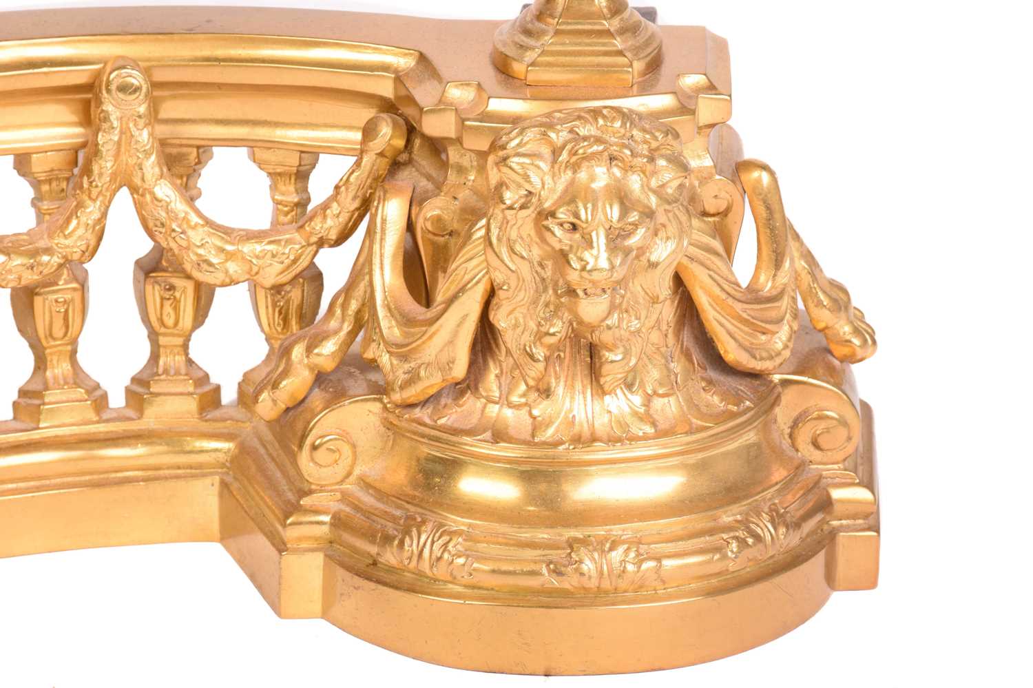 A pair of French empire-style gilt bronze chenet and valence each end with flaming urns draped - Image 4 of 7