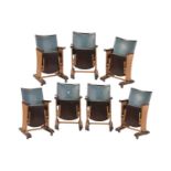 A set of seven Art Deco cast iron single-seat Cinema seats with reeded supports and original
