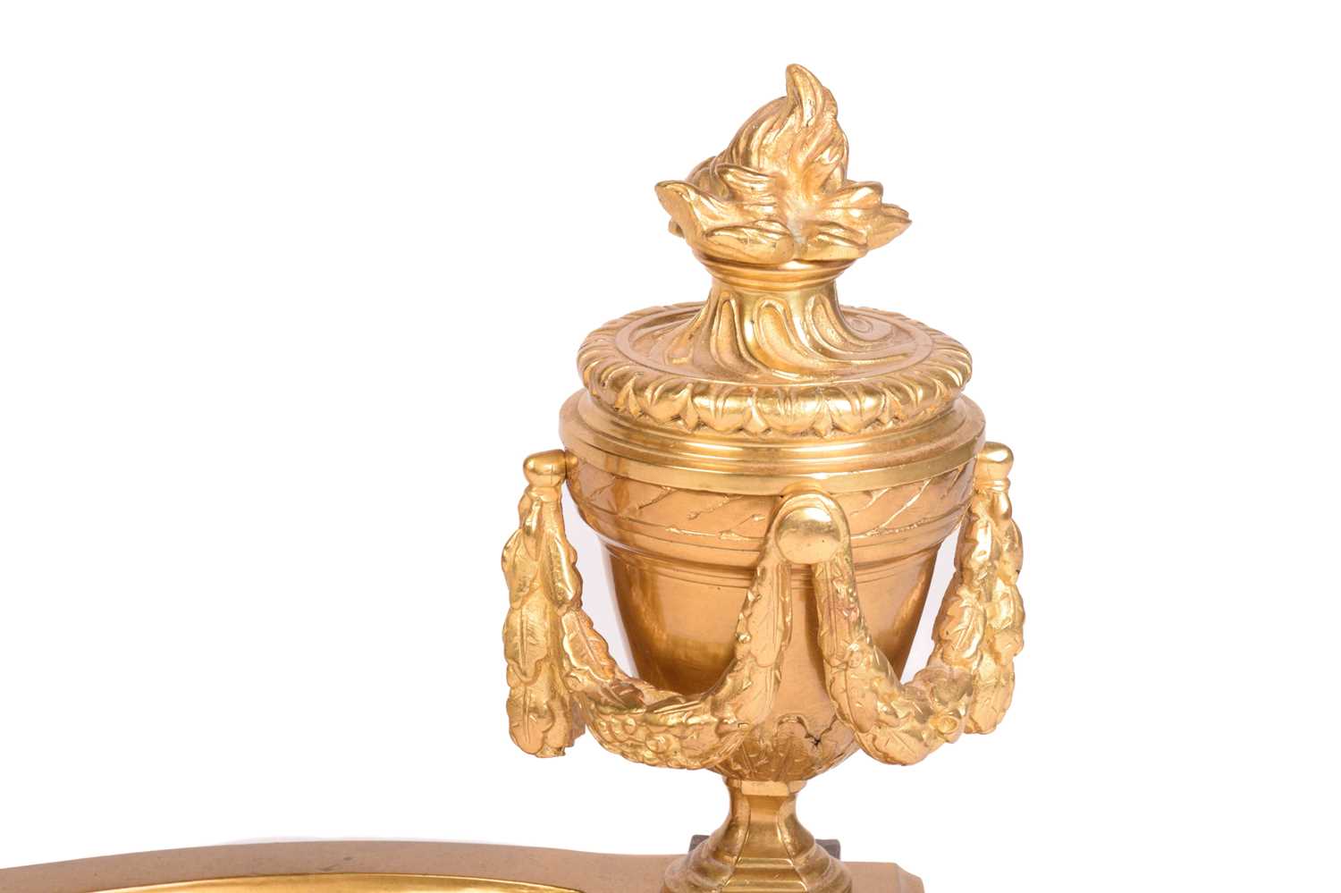 A pair of French empire-style gilt bronze chenet and valence each end with flaming urns draped - Image 2 of 7