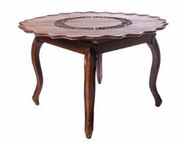 An early 20th-century Indo-Portuguese padauk centre table with pierced and carved crescent