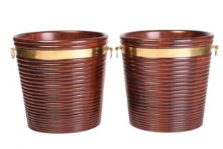 A pair of Regency style brass-bound mahogany peat buckets, of coopered ribbed form, the brass