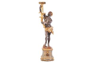 An Italian eighteenth-century style, parcel gilt and bronzed carved wood Blackamoor, the figure