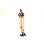 Twentieth-century painted and parcel gilt composition figural floor lamp in the form of a
