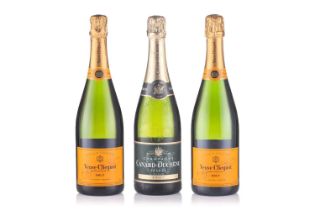 Three bottles of Champagne to include 2 x Veuve Clicquot Brut, and 1 x Canard - Duchene Brut