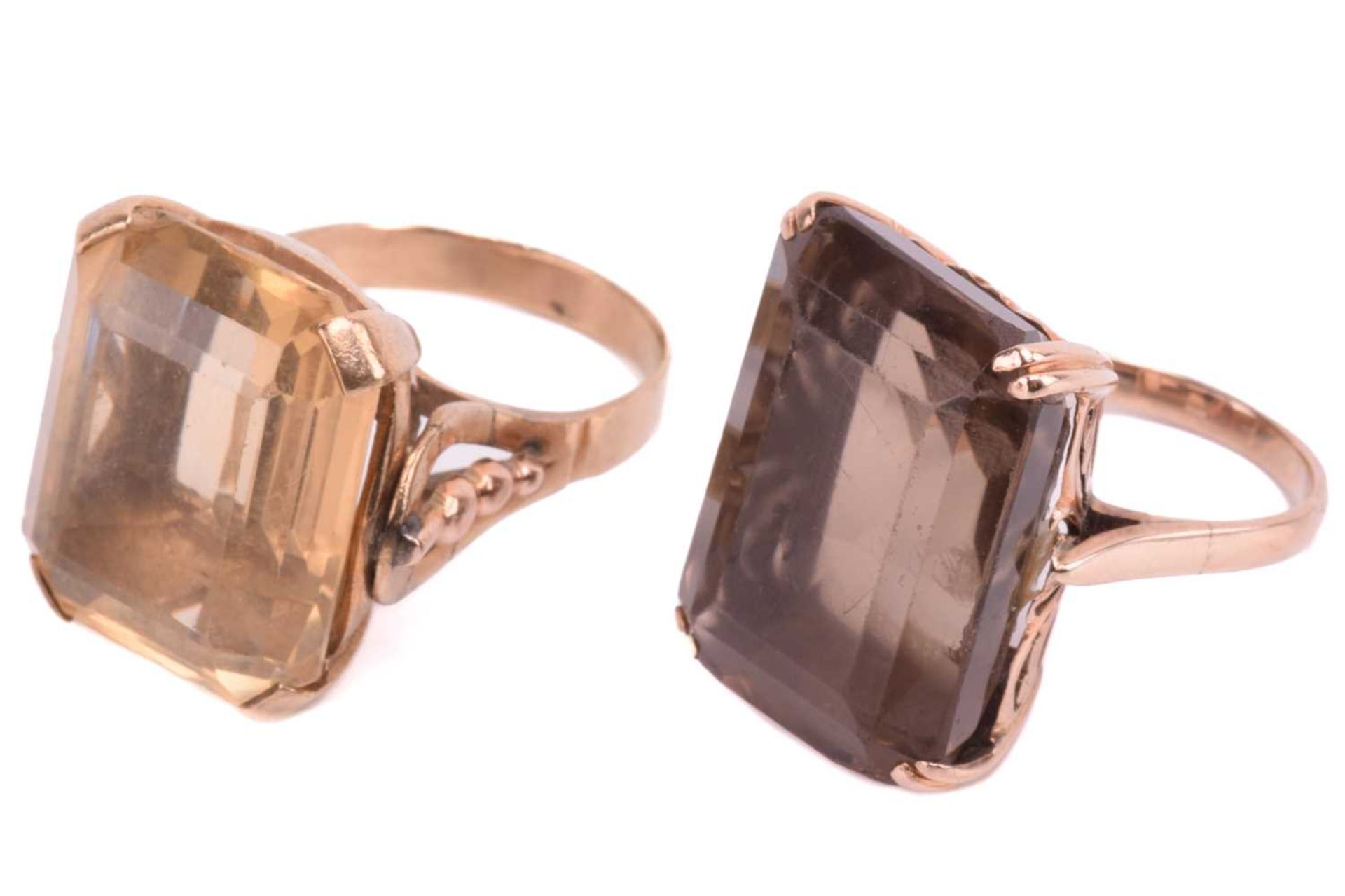 Two large quartz cocktail rings; the first comprises an octagonal step-cut smokey quartz of brown - Image 2 of 4