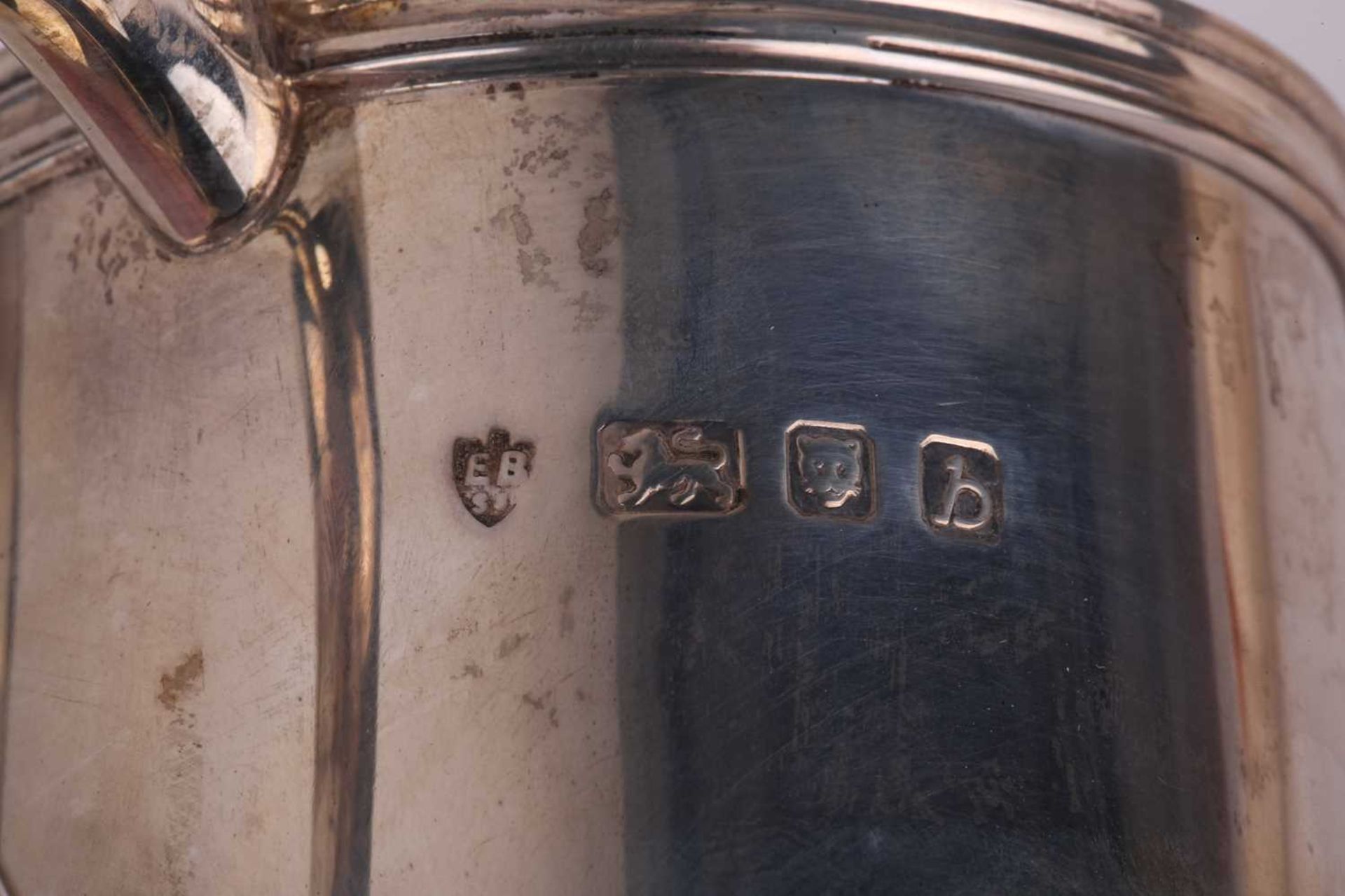 A cased silver christening set comprising a Christening mug, egg cup and spoon, napkin ring, - Image 6 of 7