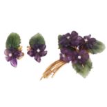A suite of carved nephrite and amethyst brooch and earrings designed as floral sprays; the brooch