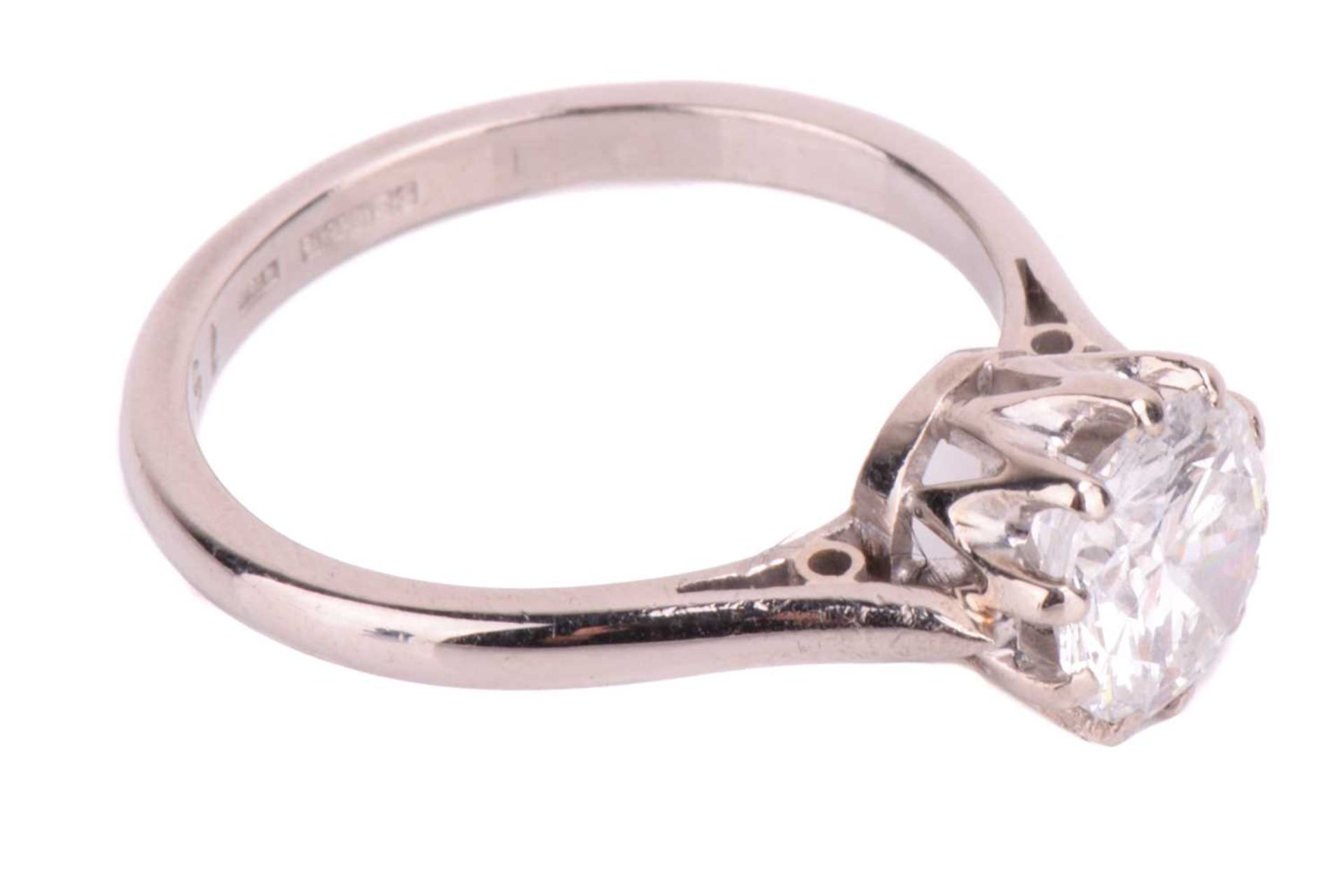A diamond solitaire ring, set with a round brilliant cut diamond with an estimated weight of 1. - Image 3 of 4