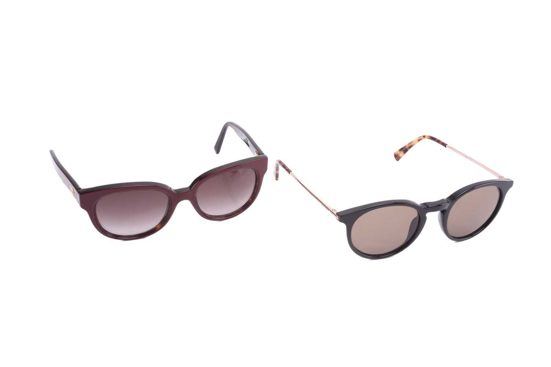 Two pairs of lady's sunglasses comprising Montblanc pair of sunglasses with black frames the