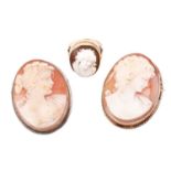 A shell cameo ring featuring a profile of a lady in high relief, the shank marked '9ct', ring size M