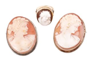A shell cameo ring featuring a profile of a lady in high relief, the shank marked '9ct', ring size M