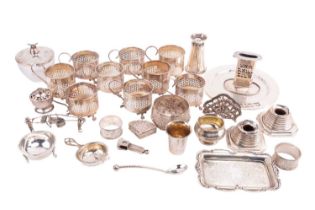 A set of six pierced tea glass holders, lacking glass liners, Birmingham 1927, and an additional
