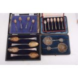 Four cased sets of spoons comprising a set of six Mappin and Webb "British Hallmarks" coffee spoons,