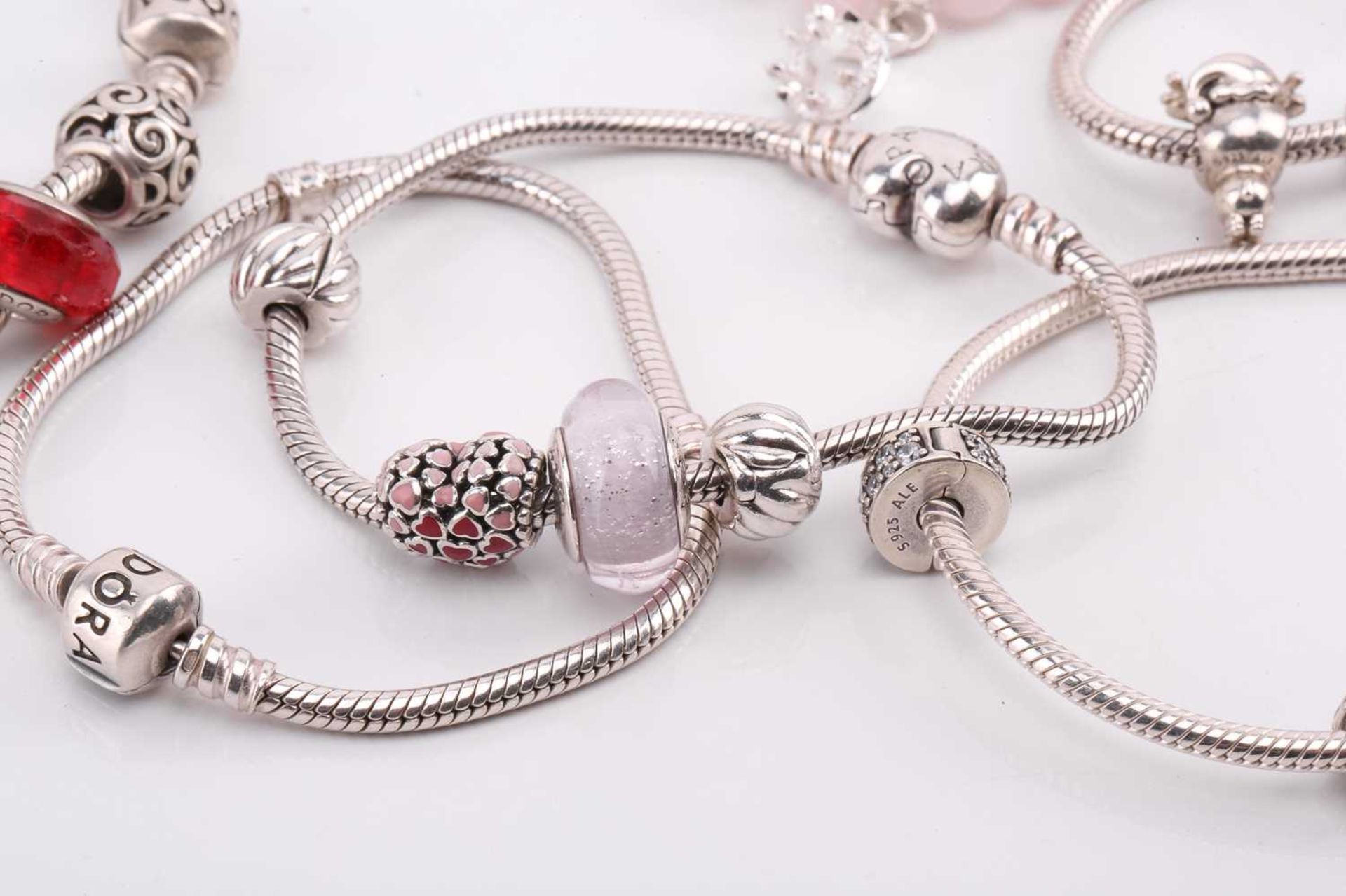 An aggregate of branded bracelets in white metal; comprising thirteen Pandora bracelets with a - Image 6 of 6