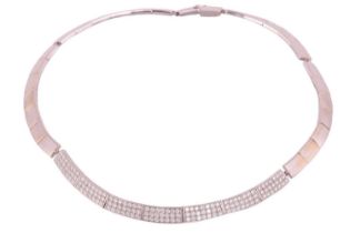 A diamond-set collar necklace, comprising articulated bar link segments, seven of the panels pavé-