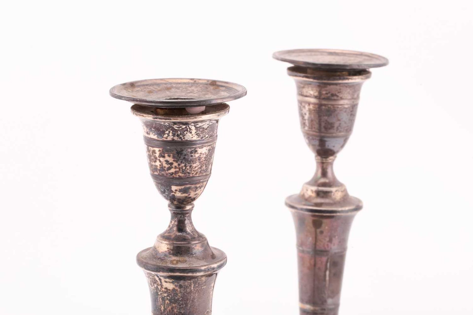 A pair of late George III silver candlesticks, of round form with flared round weighted bases, - Image 2 of 5