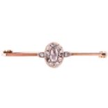 A rose cut diamond cluster bar brooch, featuring a central cluster of rose cut diamonds to a bar