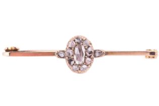 A rose cut diamond cluster bar brooch, featuring a central cluster of rose cut diamonds to a bar
