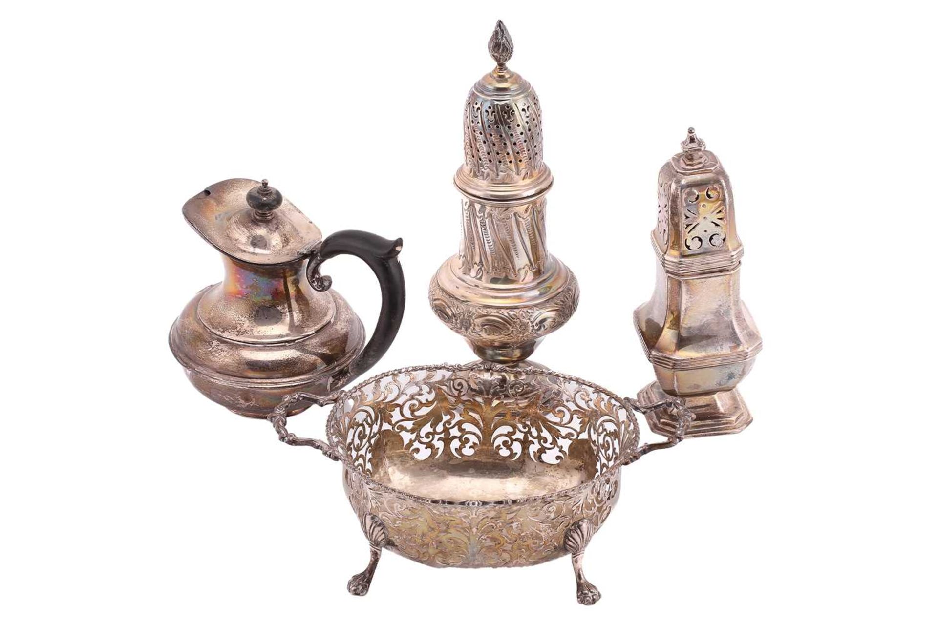 A small collection of silver comprising two silver sugar casters, a pierced basket with two - Image 2 of 6