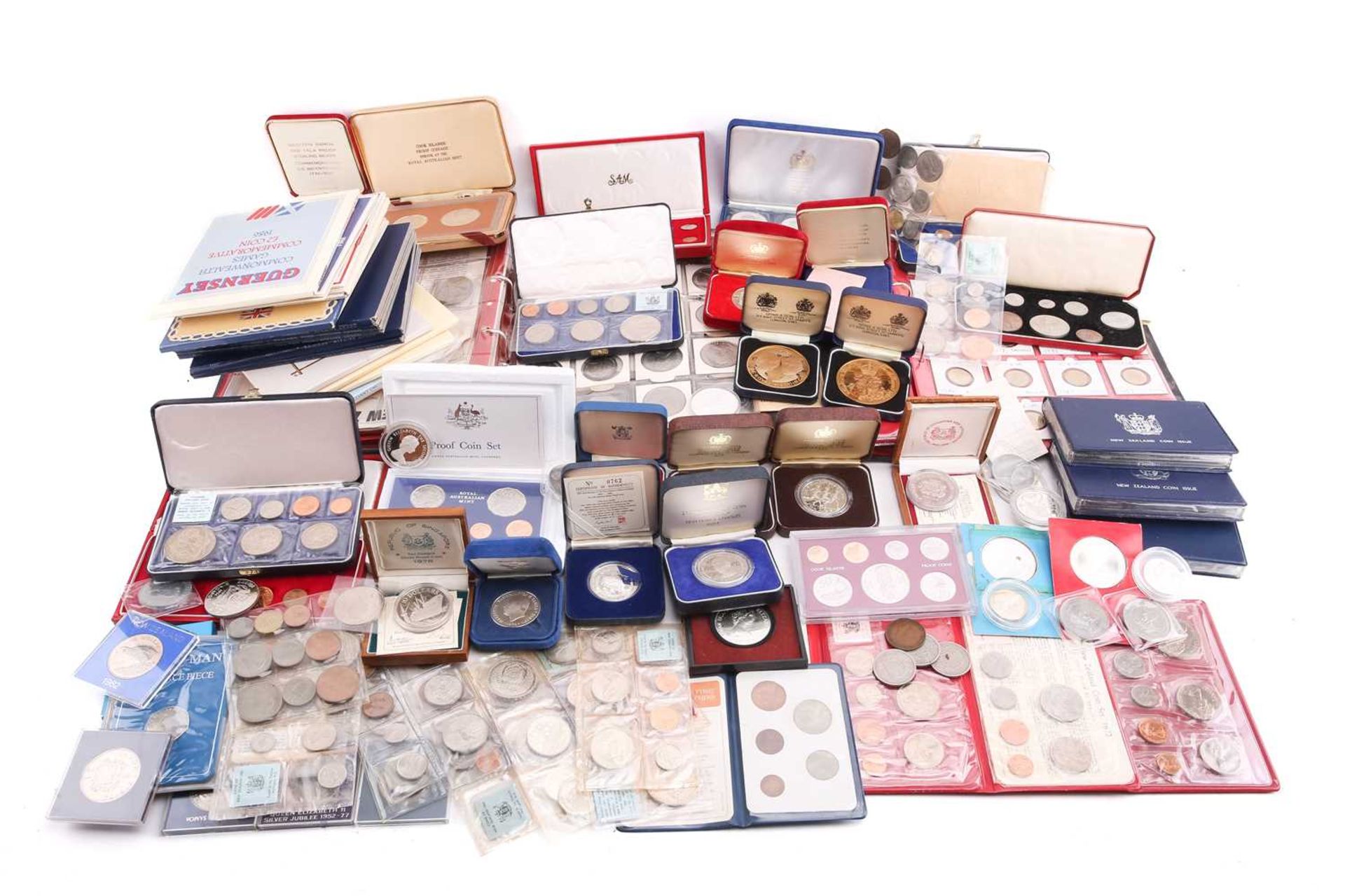 A good collection of sterling silver proof commemorative coins, many boxed with certificates, to