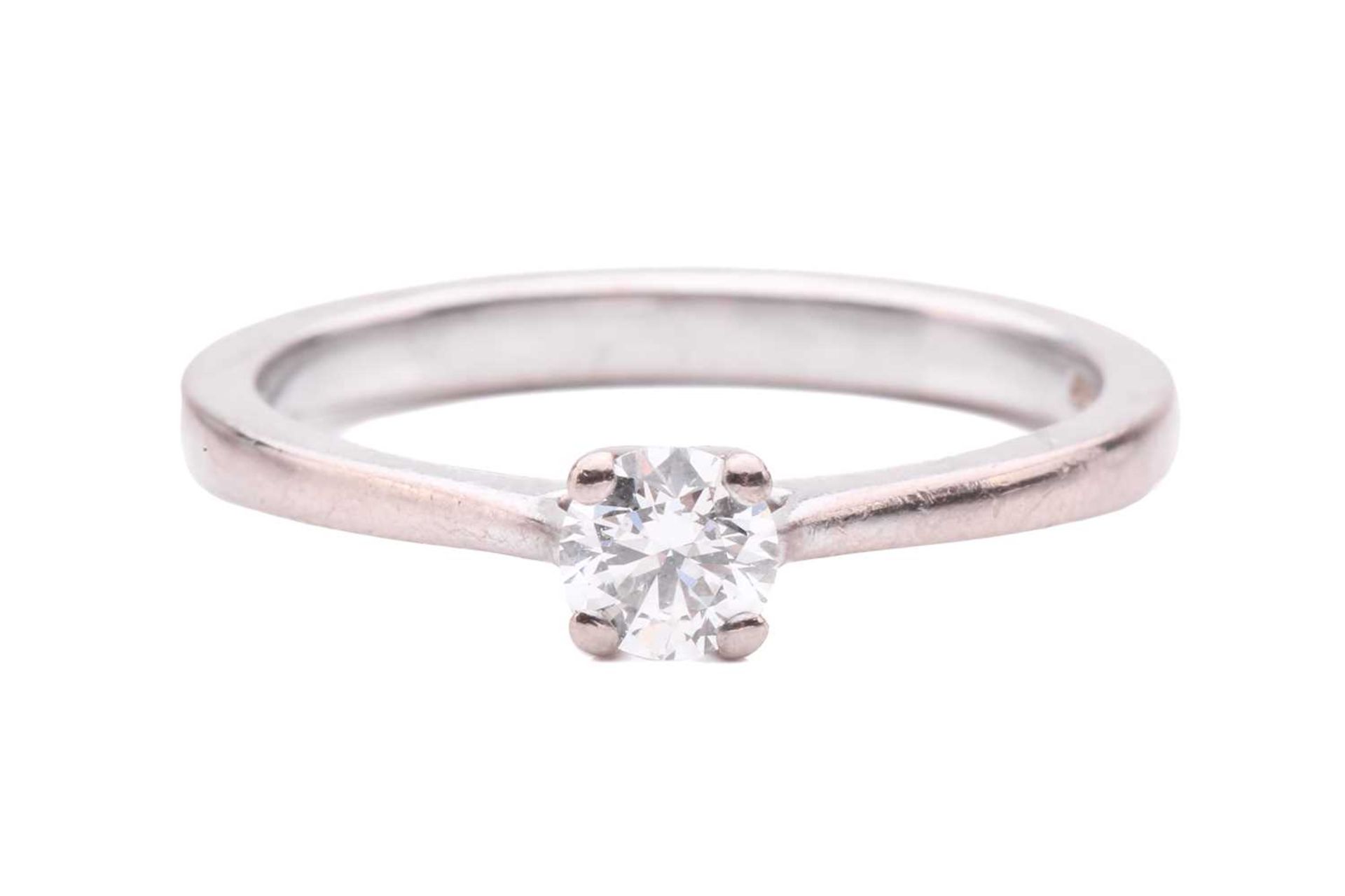 A diamond solitaire ring, set with a round brilliant cut diamond with an estimated weight of 0.35ct,