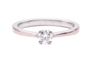 A diamond solitaire ring, set with a round brilliant cut diamond with an estimated weight of 0.35ct,