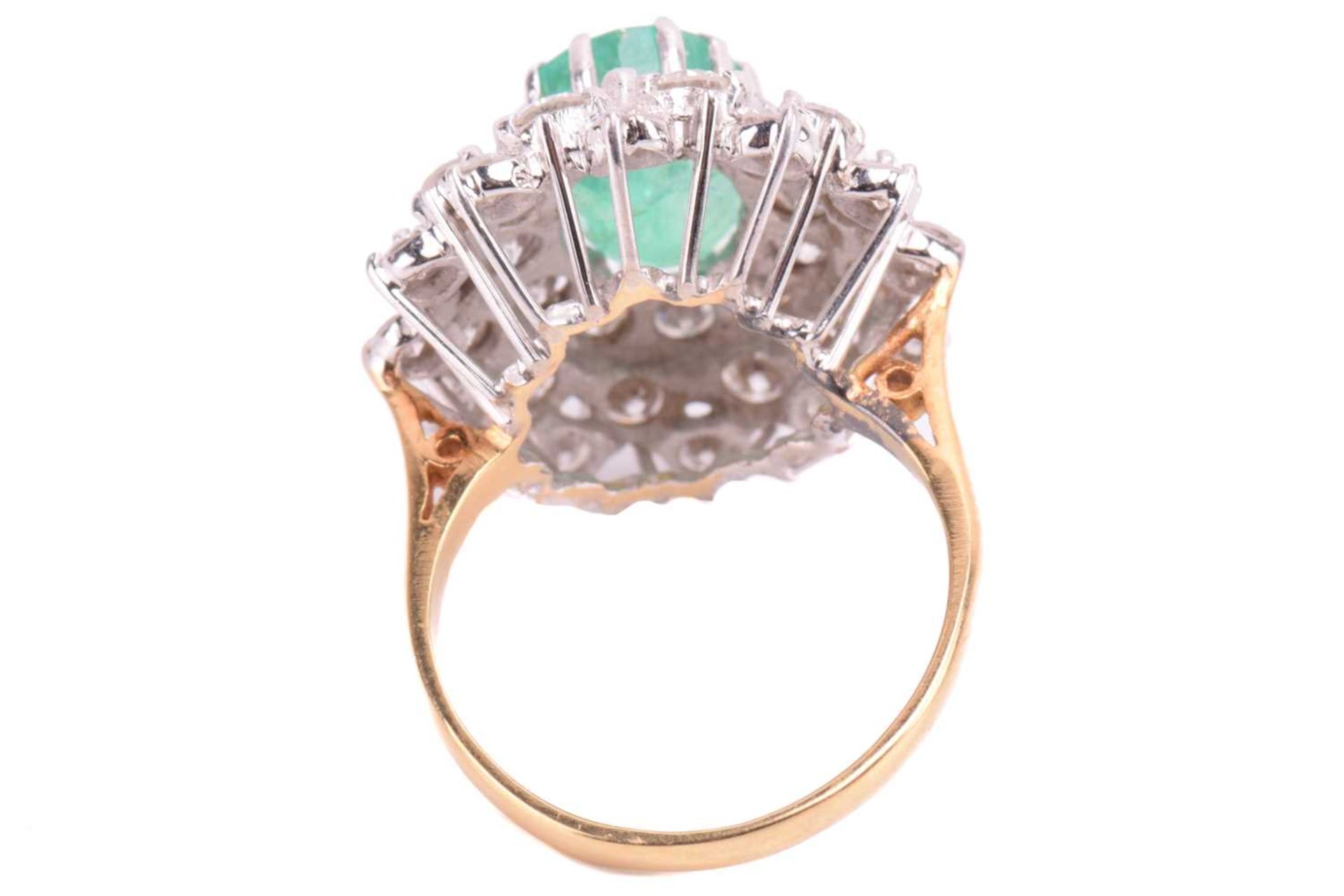 An emerald and diamond cluster ring, the fracture-filled emerald centrally set within a cluster of - Image 4 of 4