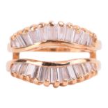 A diamond-set ring enhancer guard, set with two rows of undulated tapered baguette-cut diamonds,