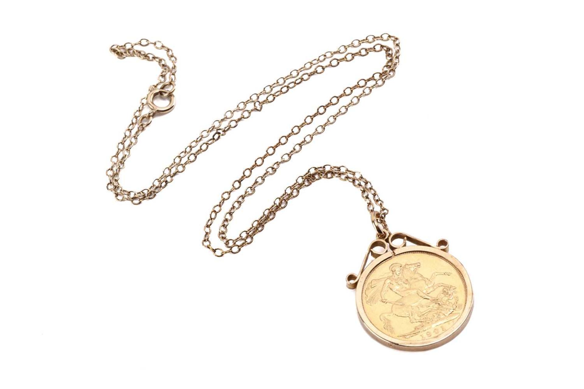 A Queen Victoria full sovereign pendant on chain, dated 1901, in 9ct yellow gold scrolled mount,