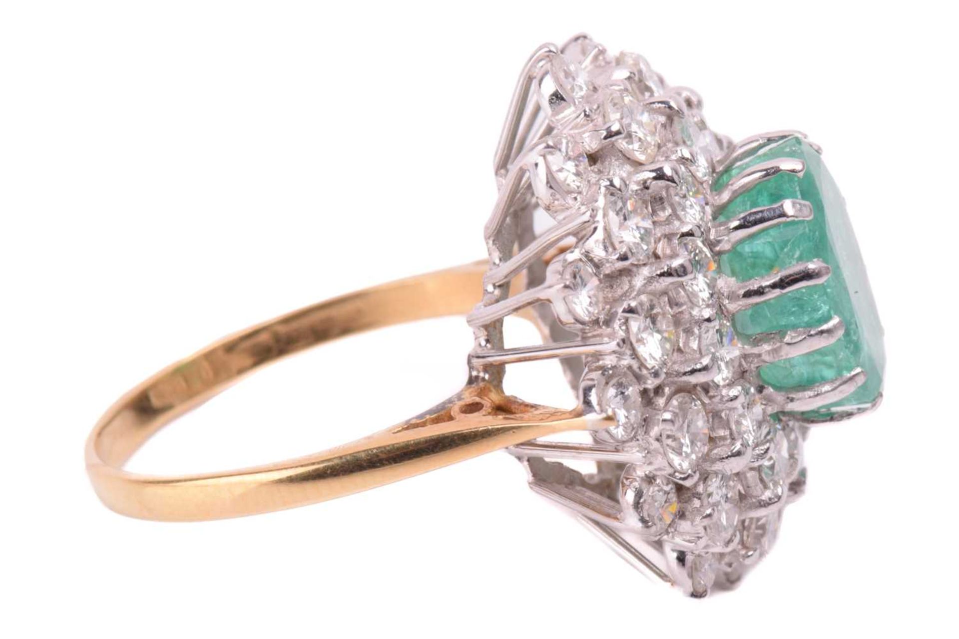 An emerald and diamond cluster ring, the fracture-filled emerald centrally set within a cluster of - Image 3 of 4