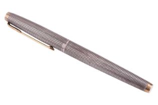 Parker- a cartridge fountain pen, the white metal barrel and pull-off cap with chiselled