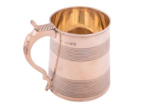 A George III silver tankard, London 1812 by Charles Fox I, the slightly tapered body with two