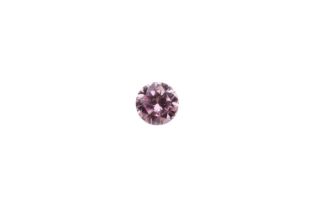 A 0.12ct loose pink Argyle diamond, round modified brilliant-cut fancy pink colour, accompanied by a