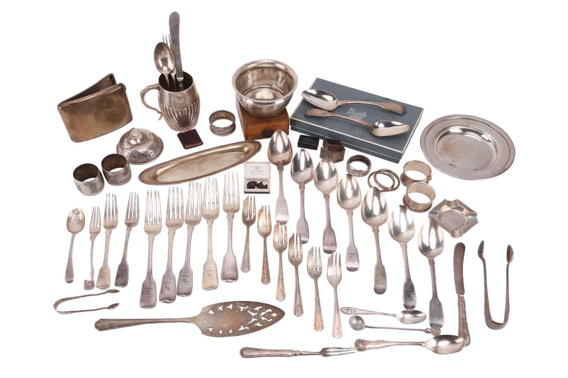 A mixed collection of silver including a Victorian barrel-shaped mug, an elongated oval pin tray,