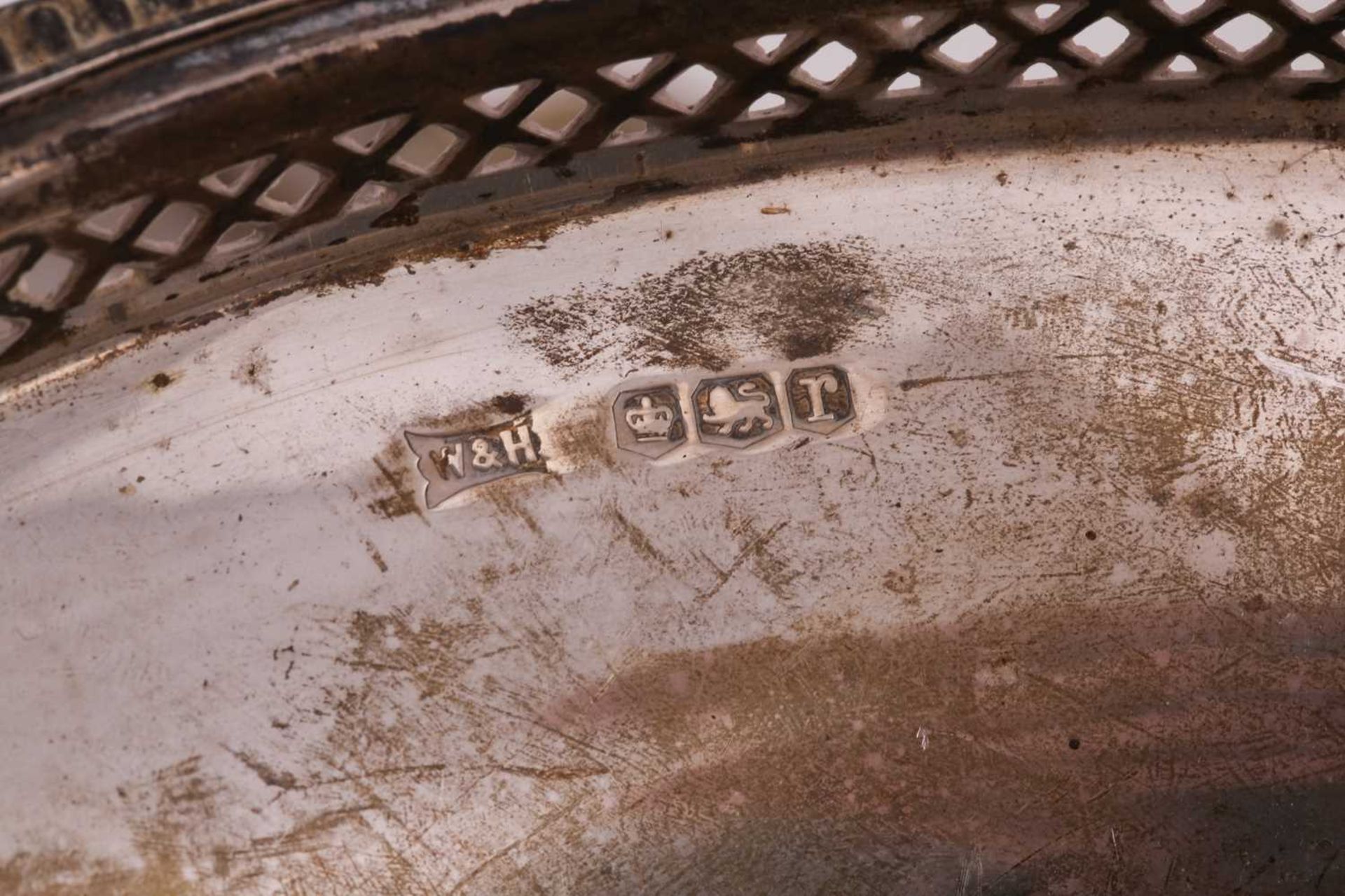 A group of five silver dishes comprising, a shallow pierced two-handled bon bon dish, a cake - Image 4 of 9