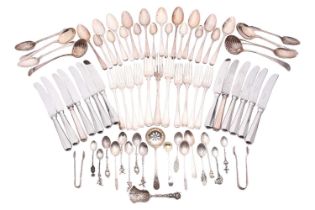 A mixed canteen of feather edge flatware, comprising; - three table forks, eight dessert forks,