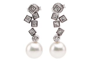 Mikimoto. A pair of Mikimoto pearl and diamond pendant earrings; comprising a drop of five