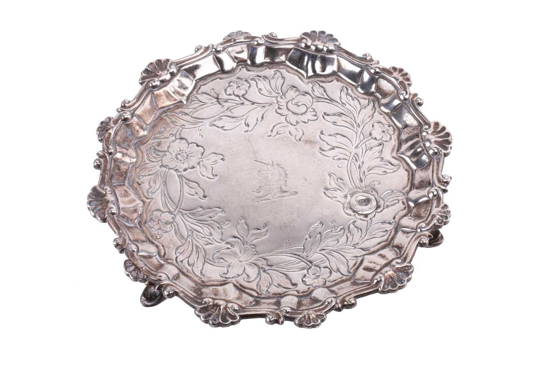 A George III silver waiter, by Richard Rugg, London 1764, of circular form, with raised border - Image 2 of 4