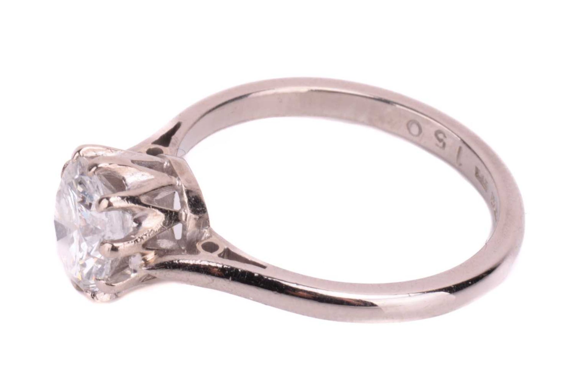A diamond solitaire ring, set with a round brilliant cut diamond with an estimated weight of 1. - Image 2 of 4