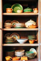 A large collection of rustic tin-glazed kitchen pottery, to include plates, bowls, tureens,
