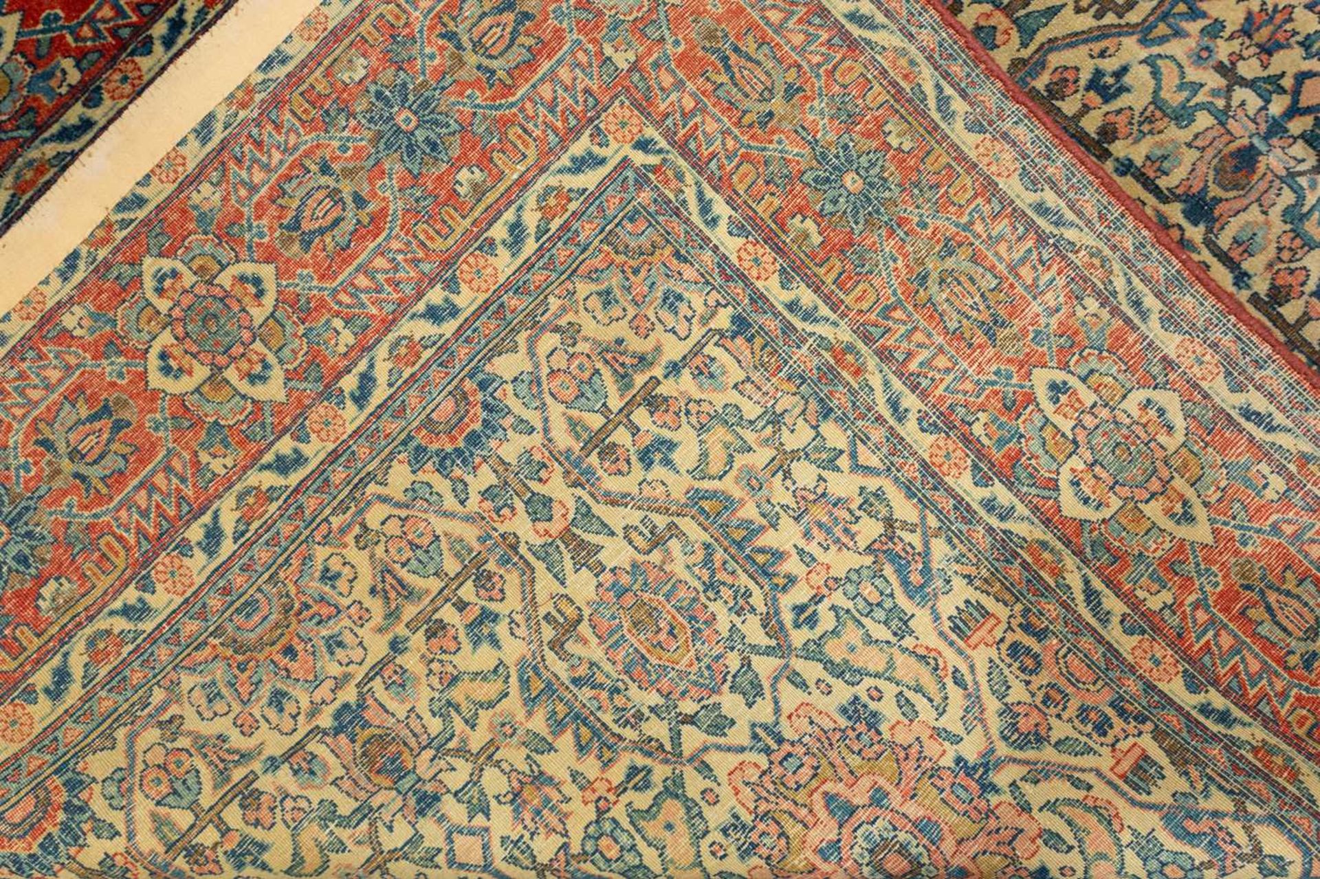 An antique ivory ground Kerman rug with an allover floral design within multiple borders 202 x 137cm - Image 2 of 10