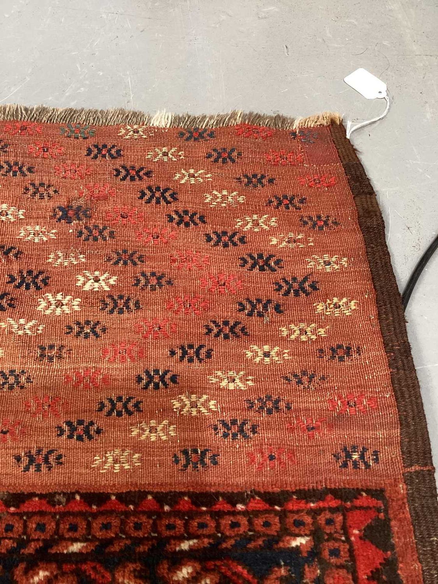 A large antique "Old country house" red ground Afghan carpet, with three rows of elephant foot - Image 14 of 28